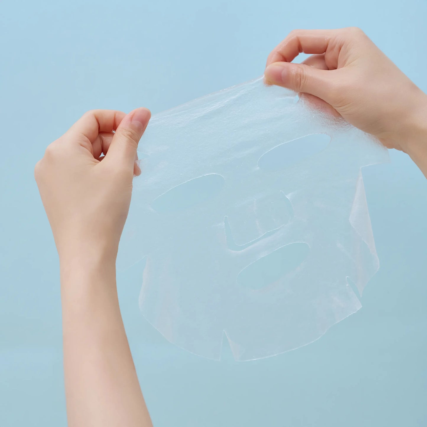 Applying SKIN1004 Hyalu-Cica Hydrating sheet mask to deeply hydrate and soothe dry skin