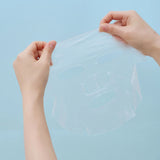 Applying SKIN1004 Hyalu-Cica Hydrating sheet mask to deeply hydrate and soothe dry skin