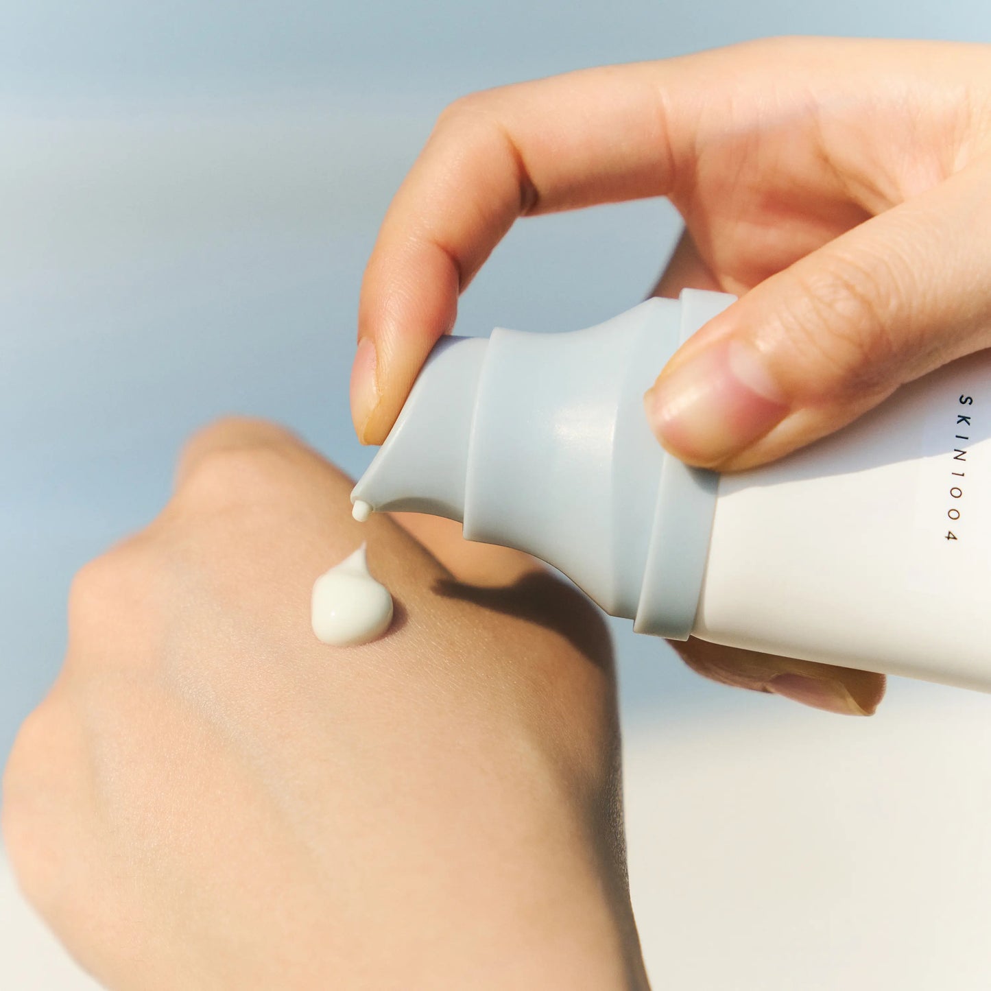 Using SKIN1004 Hyalu-Cica Water-Fit Sun Serum in daily skincare routine for hydrated and protected skin