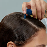 Aromatica Tea Tree Purifying Tonic being sprayed on scalp