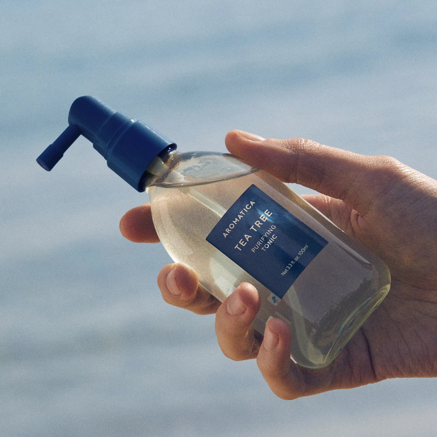 Aromatica Tea Tree Purifying Tonic 100ml held in hand