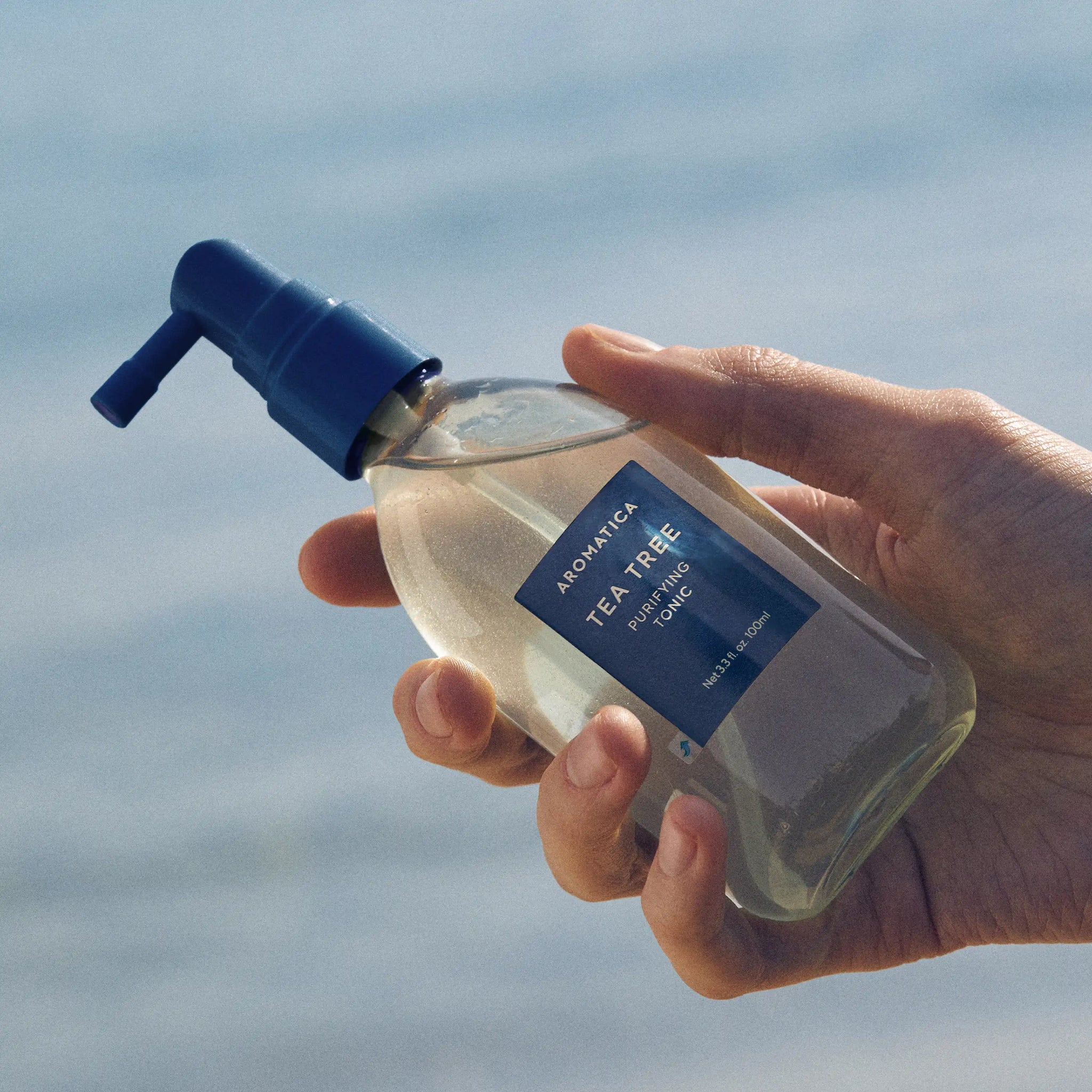 Aromatica Tea Tree Purifying Tonic 100ml held in hand