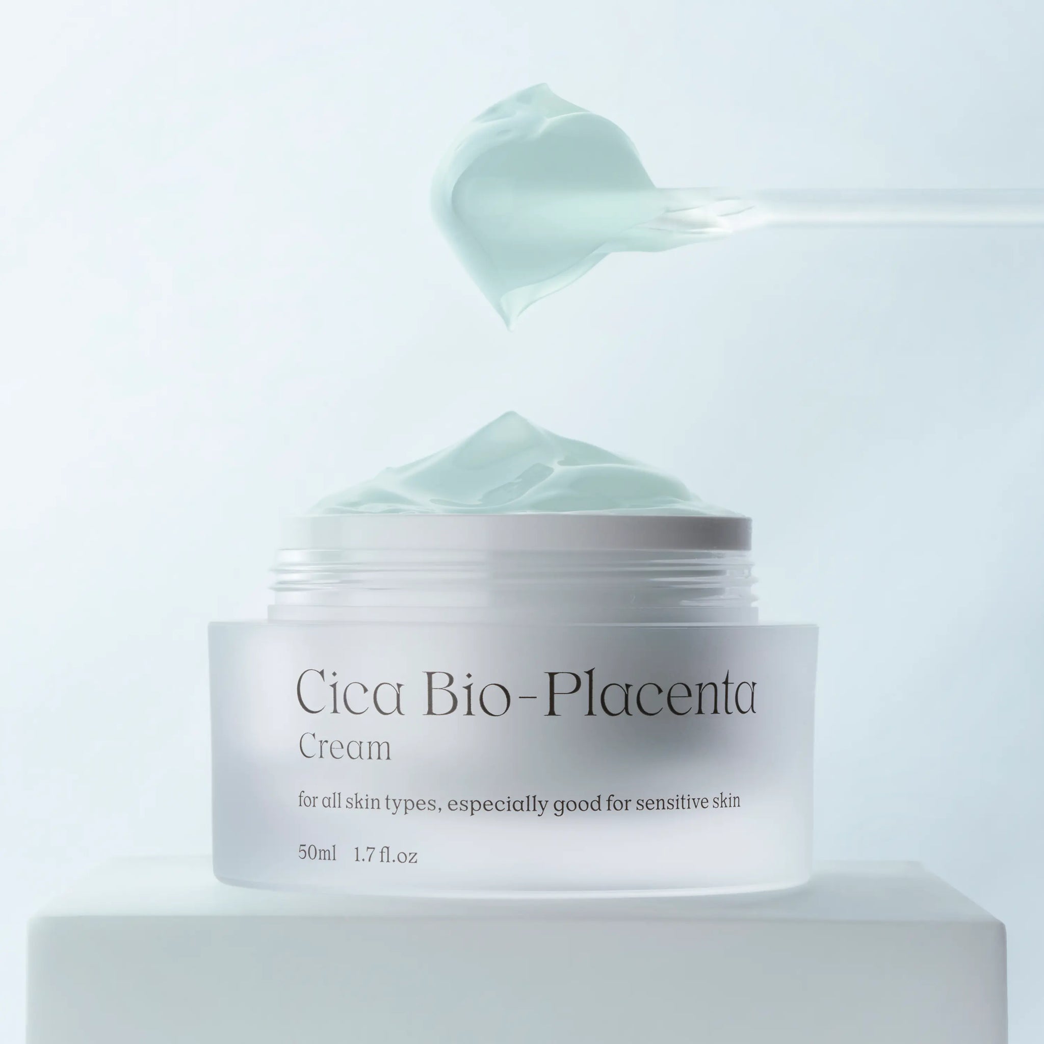 Scooping NDP Cica Bio-Placenta Cream to calm redness and support skin barrier repair