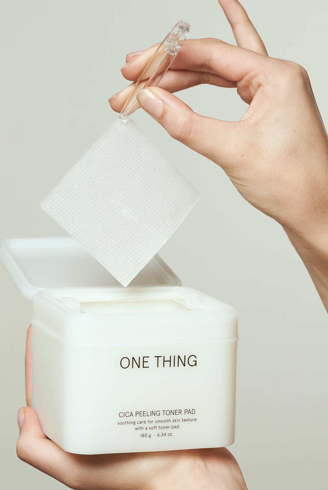 One Thing Cica Peeling Toner Pad picked up with tweezers
