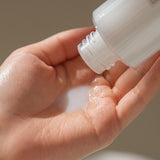 I'm From Rice Toner being poured onto hand