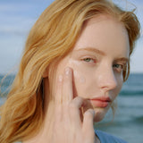 SKIN1004 Madagascar Centella Hyalu-Cica Blue Serum being applied on skin