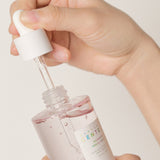 SKIN1004 Madagascar Centella Poremizing Fresh Ampoule being opened by hand