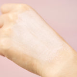 SKIN1004 Madagascar Centella Poremizing Quick Clay Stick Mask absorbed on back of hand