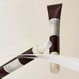 SKIN1004 Madagascar Centella Probio-Cica Bakuchiol Eye Cream tube with cream texture