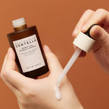 SKIN1004 Madagascar Centella Probio-Cica Intensive Ampoule dispensed onto hand with dropper