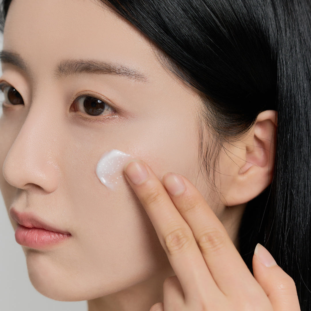 SKIN1004 Madagascar Centella Tone Brightening Capsule Cream being applied on face