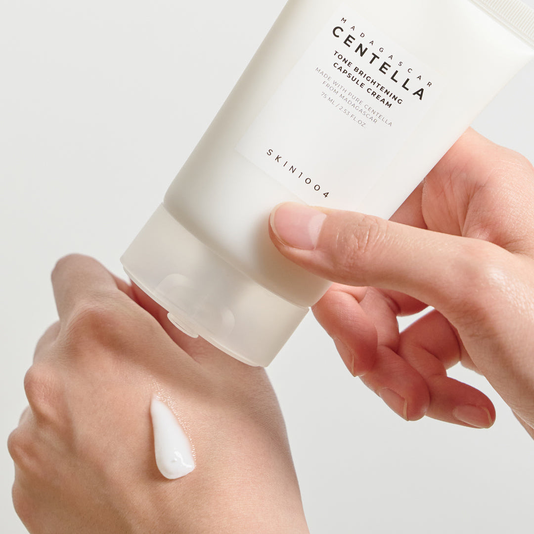SKIN1004 Madagascar Centella Tone Brightening Capsule Cream applied on back of hand