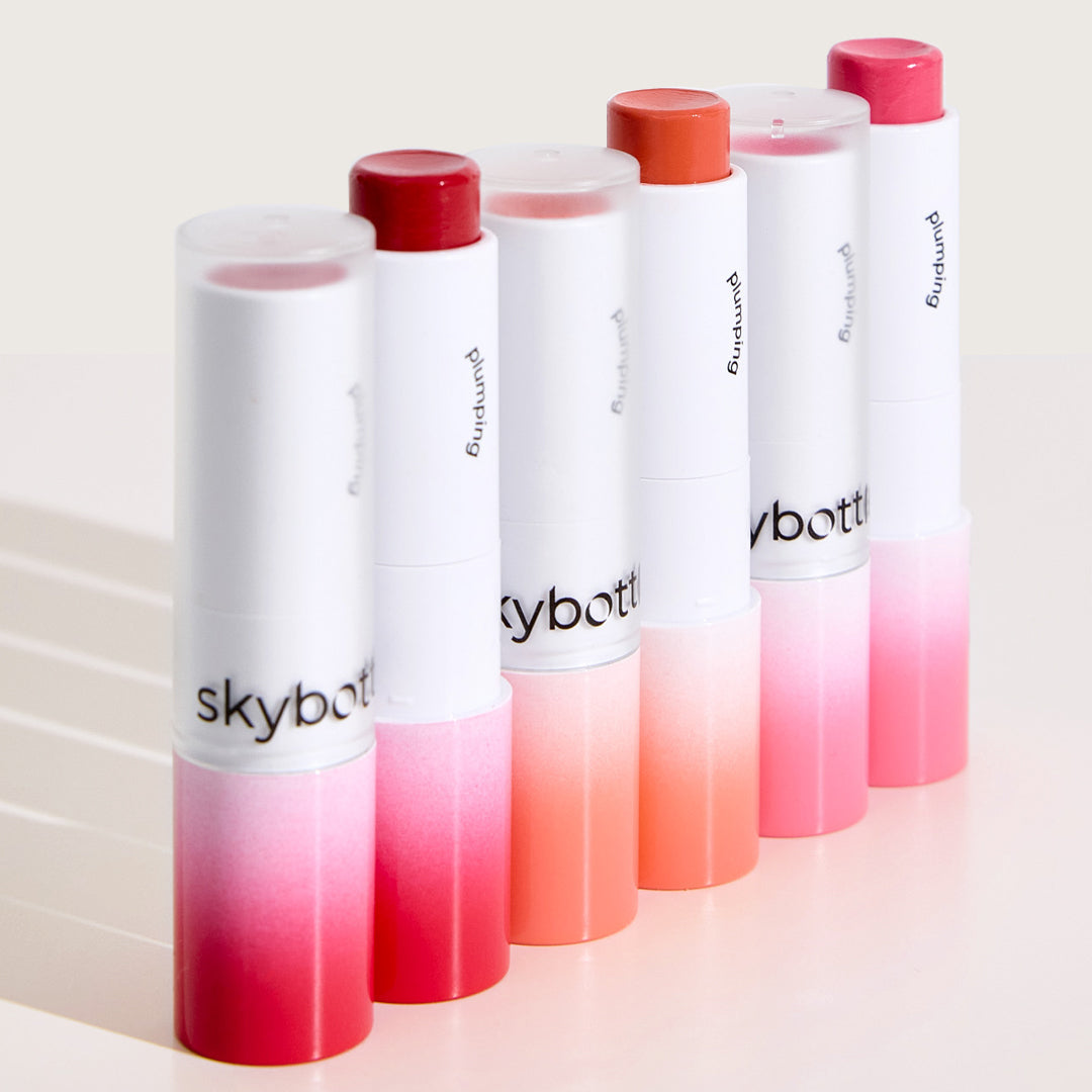Skybottle Volumizing Color Lip Balm three colors open and closed six pieces